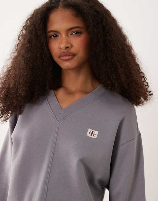 Calvin Klein Jeans Woven Label French Terry long sleeve v neck sweatshirt in silver, 3 of 4