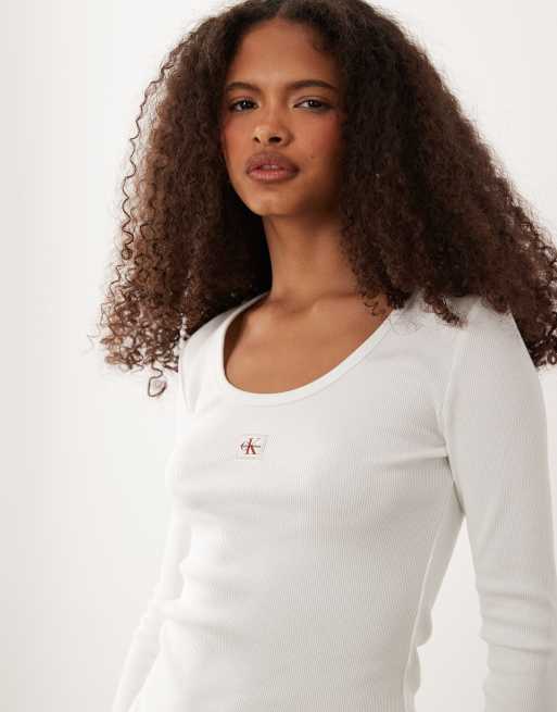 Calvin Klein Jeans woven label long sleeve rib scoop neck top in white, 3 of 4