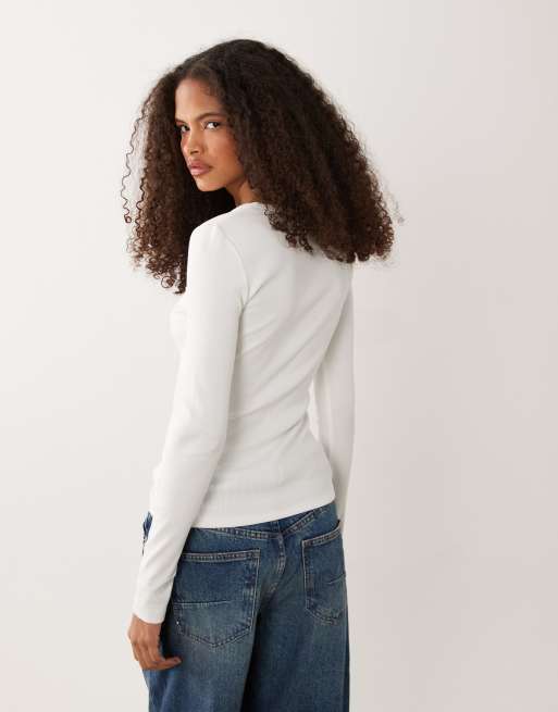 Calvin Klein Jeans woven label long sleeve rib scoop neck top in white, 4 of 4