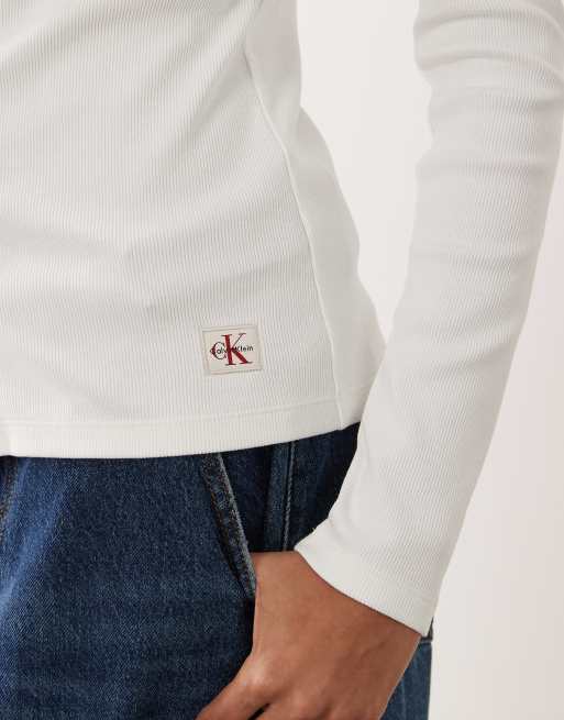 Calvin Klein Jeans woven label long sleeve v neck rib button top in white, 3 of 4