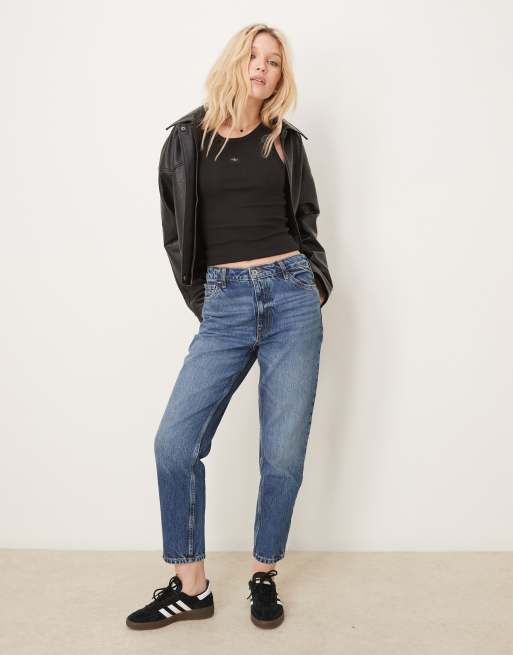 Calvin Klein Jeans woven label tank top in black | ASOS