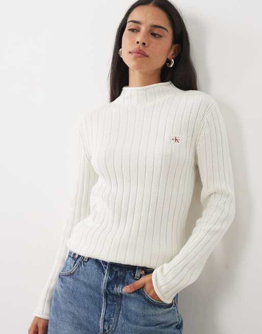Calvin Klein Jeans woven label turtle neck jumper with frill edge in off-white, 3 of 5