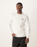 [Calvin Klein Jeans] Calvin Klein Jeans woven label waffle long sleeve top in off white-Neutral 48 Silver Birch