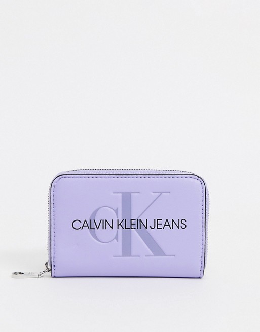 Calvin Klein Jeans zip around purse in lilac