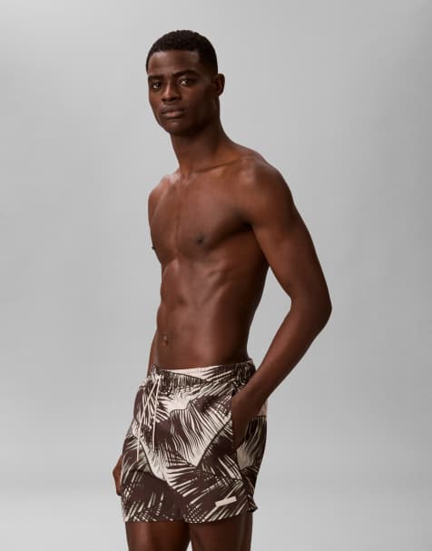 Calvin Klein – Korta badshorts med palmmönster - view 1