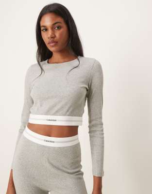 Calvin Klein - Langärmliges, geripptes Cropped-Oberteil in Grau mit modernem Design