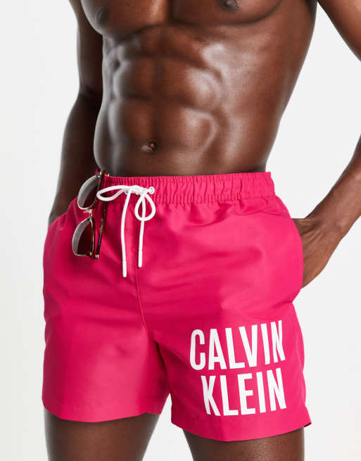 Calvin Klein large graphic swim shorts in pink ASOS