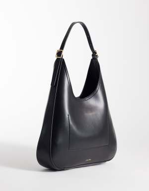 Calvin Klein large sleek bucket bag wit gold details in black