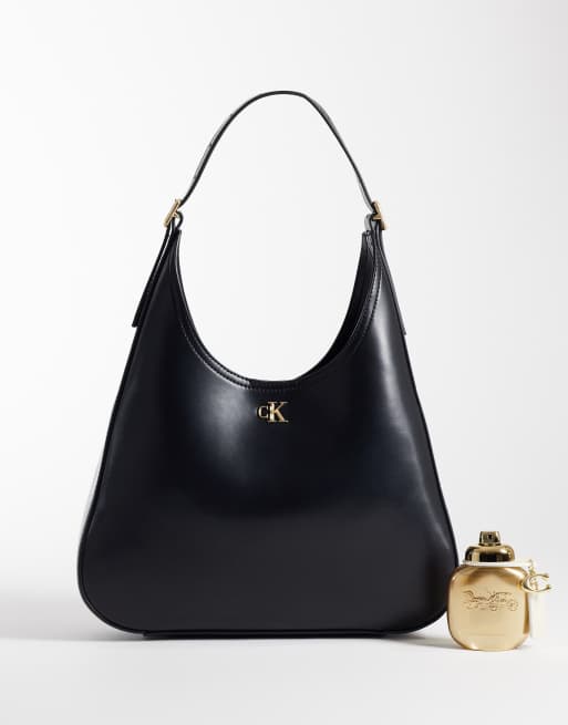 Calvin Klein large sleek bucket bag wit gold details in black, 4 of 4