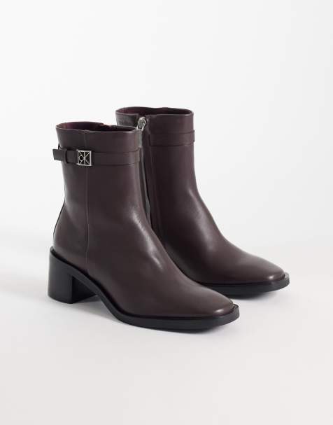 Calvin Klein leather ankle boot with block heel and silver hardware buckle detail in chocolate brown - view 1
