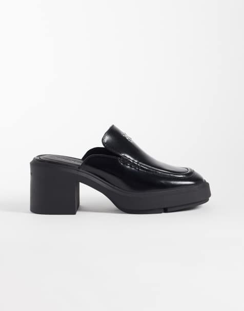 Calvin Klein leather block heel mules in black - view 1