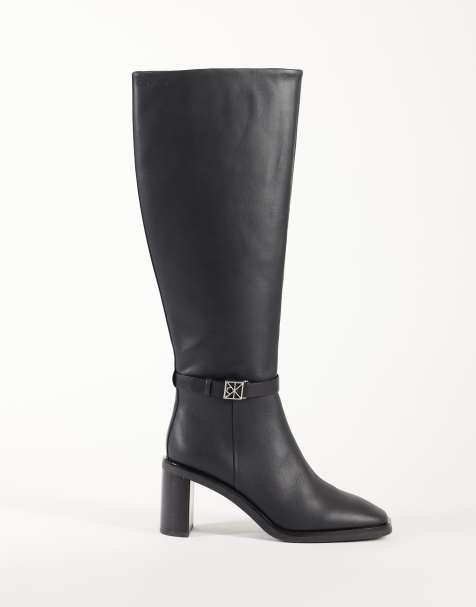 Calvin Klein leather high knee boots with block heel and logo buckle detail in black - view 1