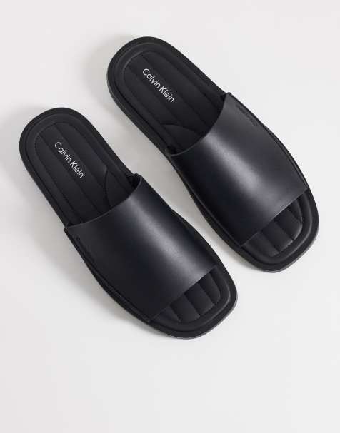 Calvin Klein leather slides with debossed logo in black - view 1