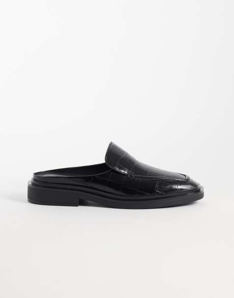 Calvin Klein leather square toe mules with croc embossment in black - view 1