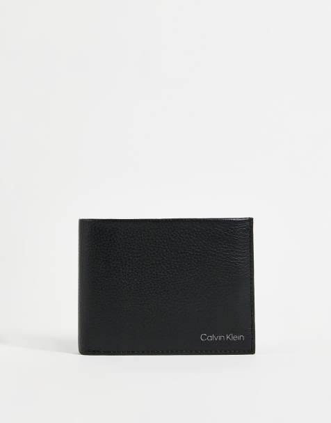 Calvin Klein leather wallet with coin pouch in black - view 1