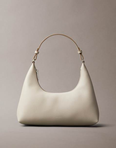 Calvin Klein - Leren schoudertas in beige - view 1