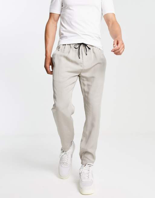 Calvin Klein linen twill tapered pants in beige ASOS