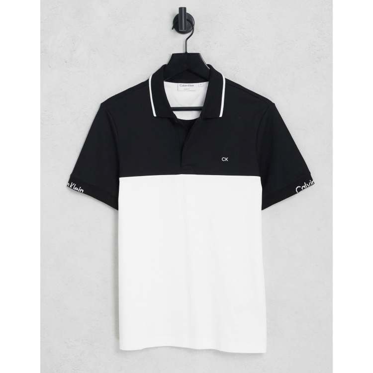 Calvin Klein liquid touch blocking logo polo in white/black ASOS - Main Image