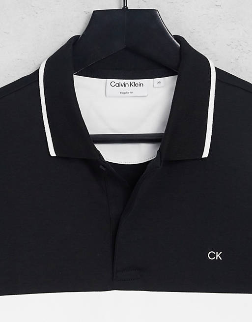 Calvin Klein liquid touch blocking logo polo in white/black | ASOS