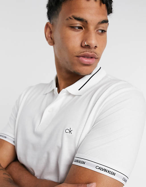Calvin Klein liquid touch logo cuff polo in white | ASOS