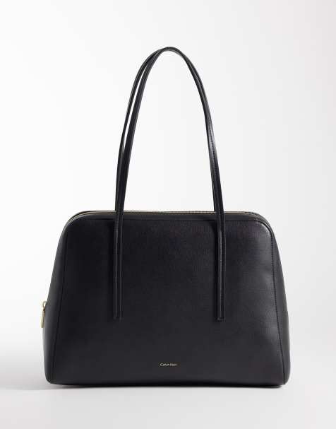 Calvin Klein logo bowling bag in black - view 1