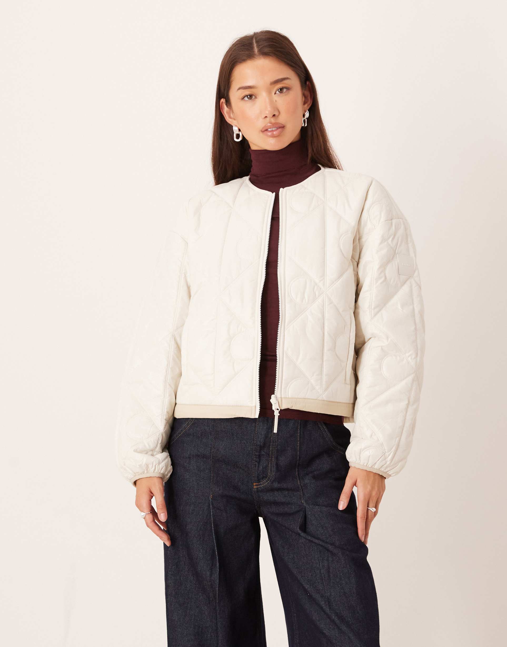 calvin klein logo quilted shine liner jacket in off white