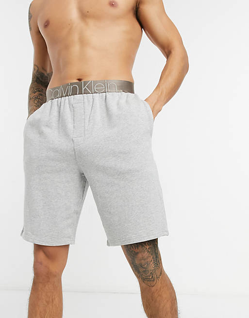 Calvin Klein logo sleep shorts in light gray | ASOS