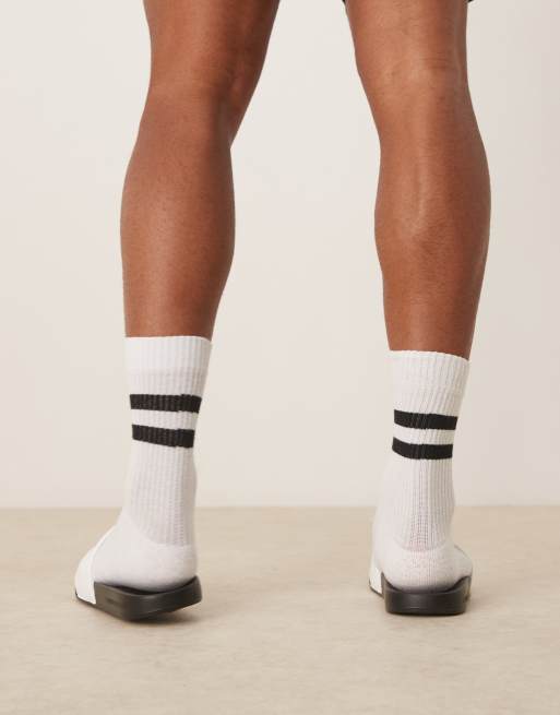 Calvin Klein logo slides in white and black, 3 of 4