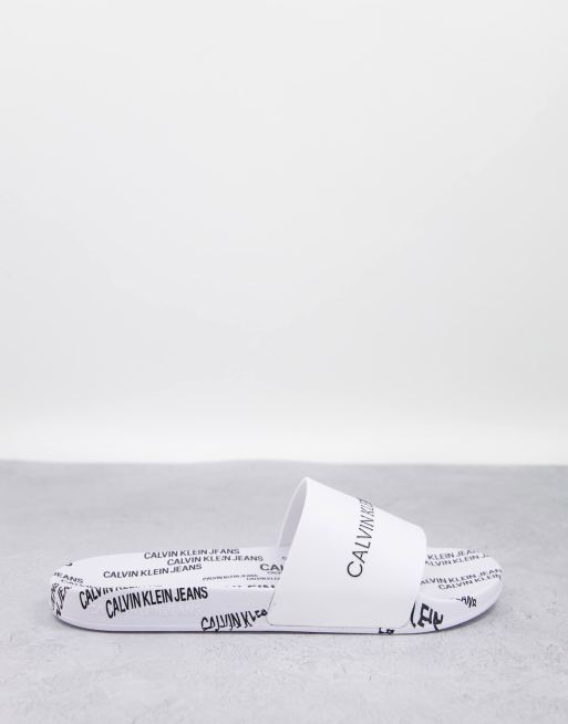 Calvin Klein logo sole sliders in white ASOS