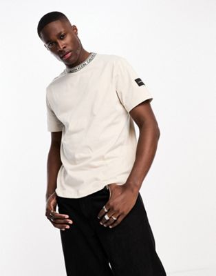 Calvin Klein logo tape collar and side patch t-shirt in stone - exclusive to ASOS - ASOS Price Checker