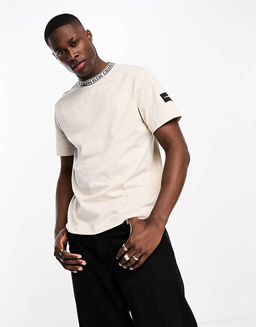 Calvin Klein logo tape collar and side patch t-shirt in stone - exclusive to  ASOS | ASOS