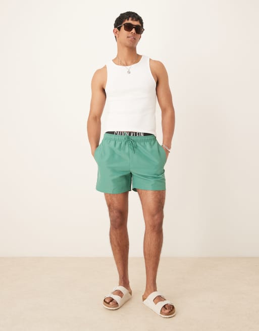 Calvin Klein logo waistband swim shorts in green, 4 of 4