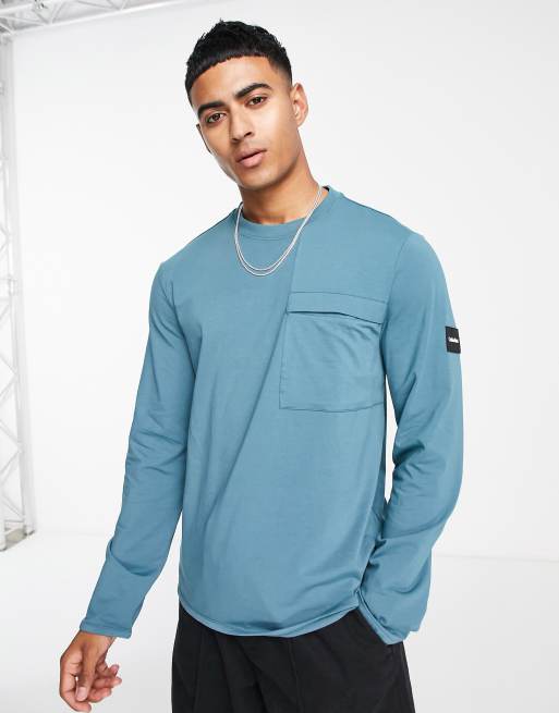 Calvin Klein long sleeve t-shirt with pocket in blue | ASOS