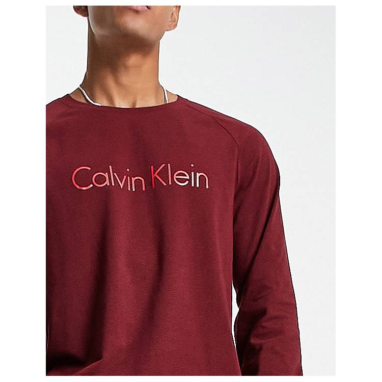 Calvin Klein long sleeve top and pants lounge set in red | ASOS