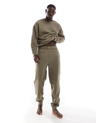 Calvin Klein - Lounge-joggingbroek in olijfgroen met logo in dezelfde ...