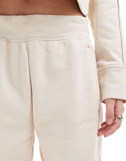 Calvin Klein – Lounge-Jogginghose in Creme mit farblich abgestimmtem Logobund, 5 von 5