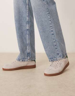 Calvin Klein low cupsole suede trainers in off white and green with gum sole