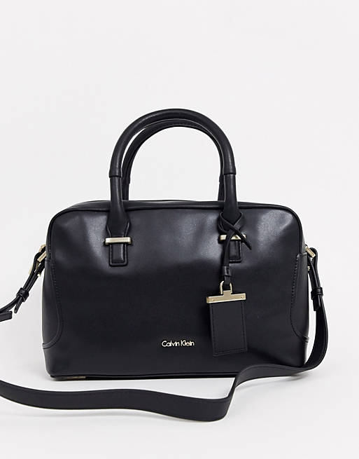 Calvin Klein Marina logo duffle bag in black | ASOS