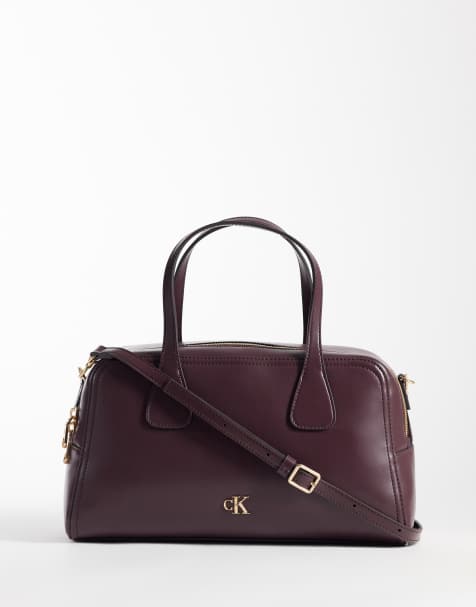 Calvin Klein medium bowling bag with strap in fudge brown - view 1
