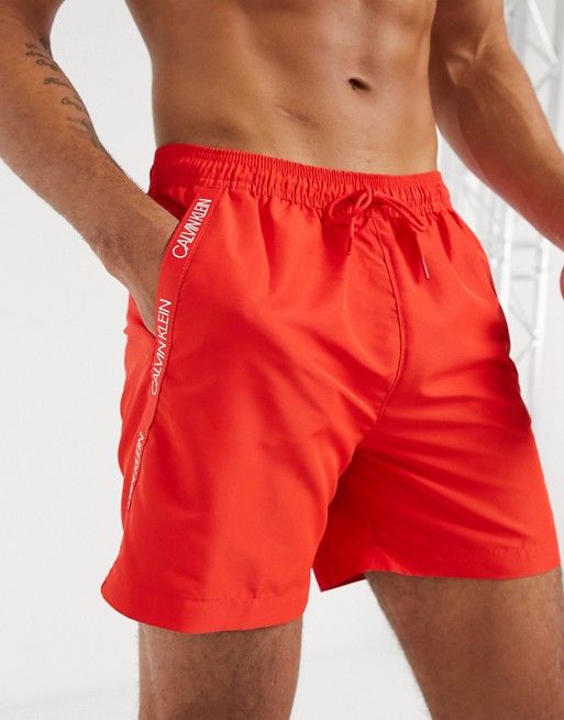 Calvin Klein medium length swim shorts in red