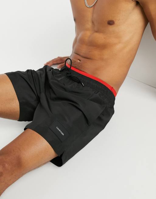 Calvin Klein medium length swim shorts with double waistband in black