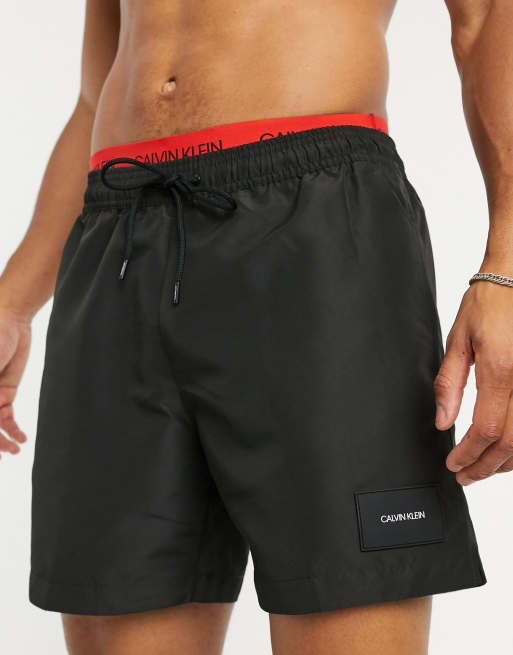 Calvin Klein medium length swim shorts with double waistband in black