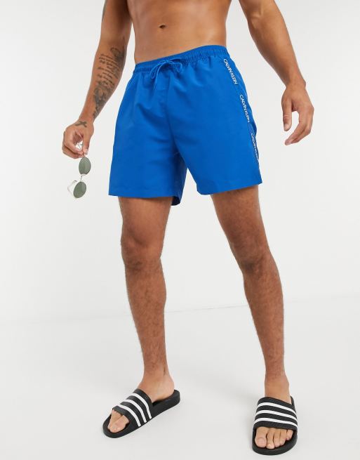 CALVIN KLEIN - Men's surf swim shorts with monogram - Blue