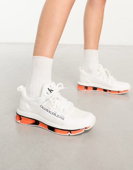 Calvin Klein Meryl white sneakers with contrast orange sole ASOS