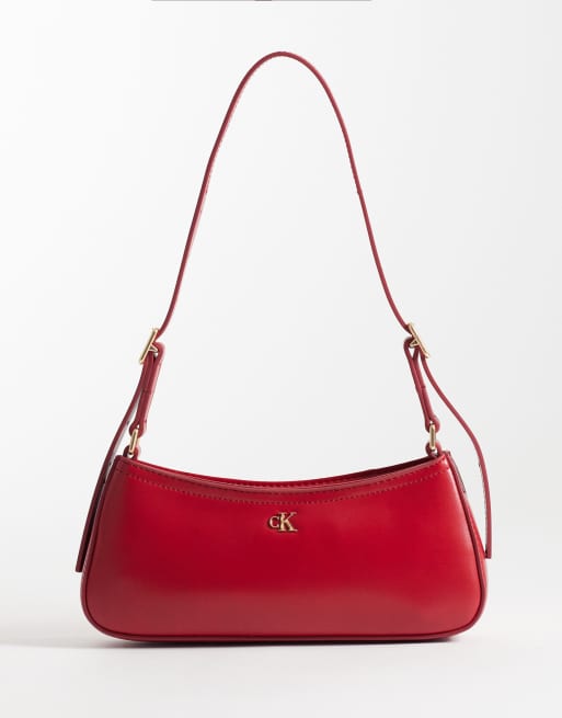 Calvin Klein mini borsa a spalla con dettagli dorati in rosso acceso