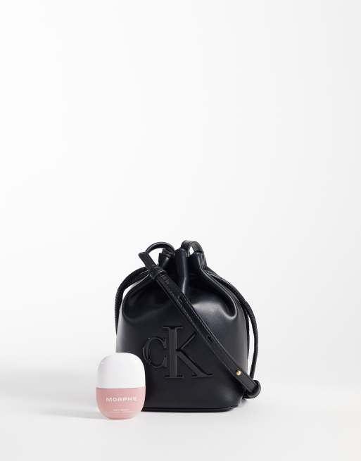 Calvin Klein mini crossbody bucket bag with bold logo in black, 2 of 4