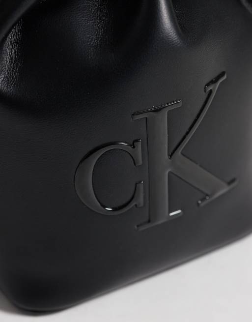 Calvin Klein mini crossbody bucket bag with bold logo in black, 3 of 4