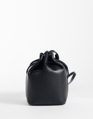 Calvin Klein mini crossbody bucket bag with bold logo in black