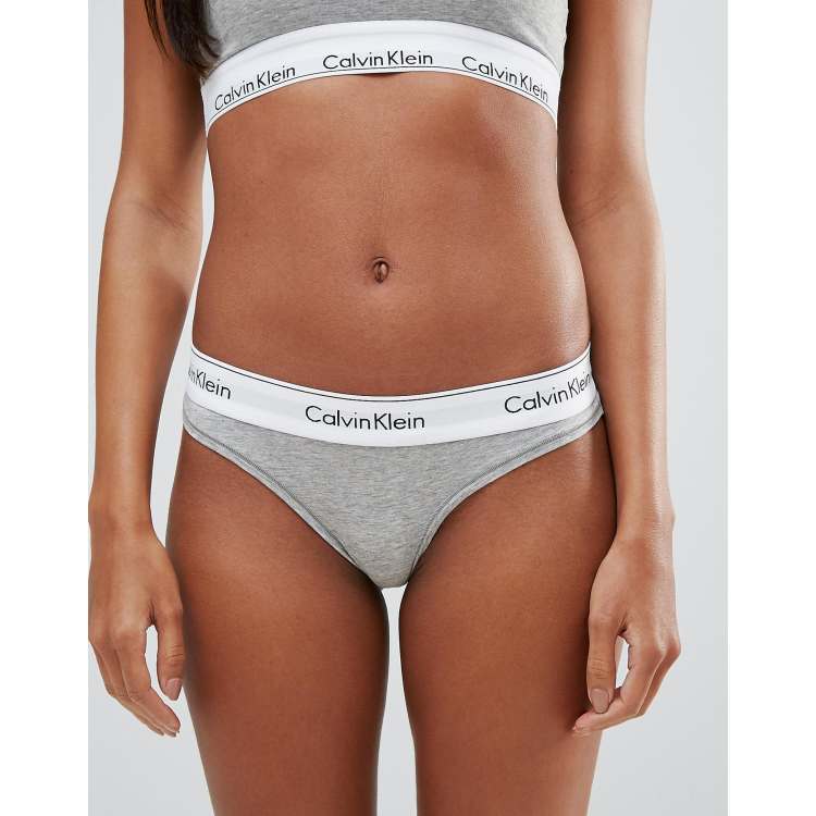  Calvin Klein Women's Modern Cotton Naturals Thong, Woodland, 1X  : Clothing, Shoes & Jewelry