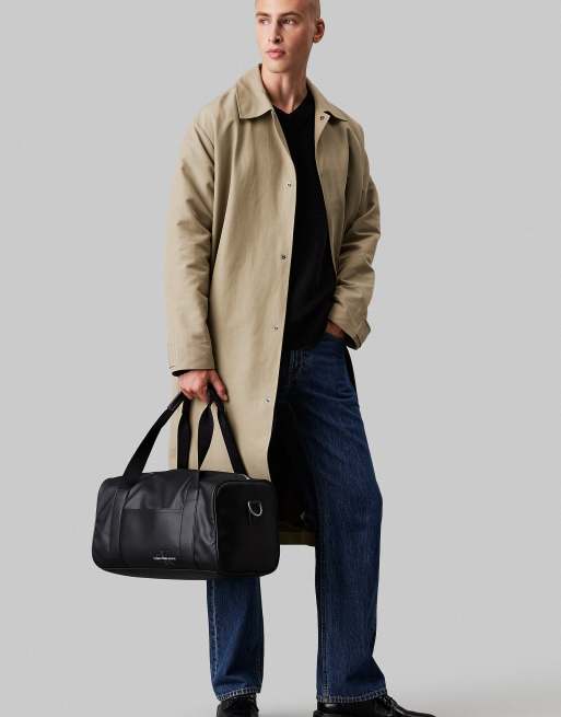 Calvin Klein mono logo flightt duffle bag in Black ASOS